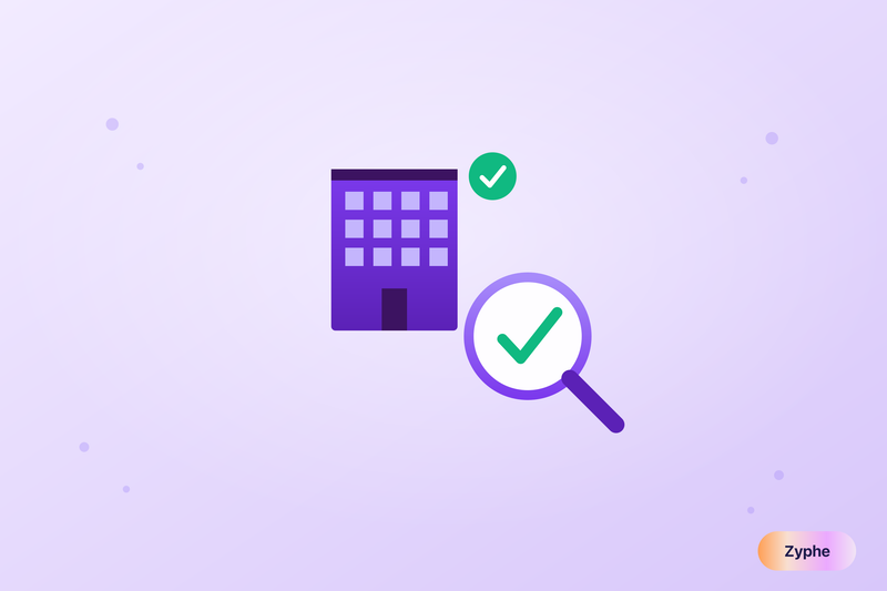 A magnifying glass with a green check over an office building, illustrating how to verify a company is legitimate